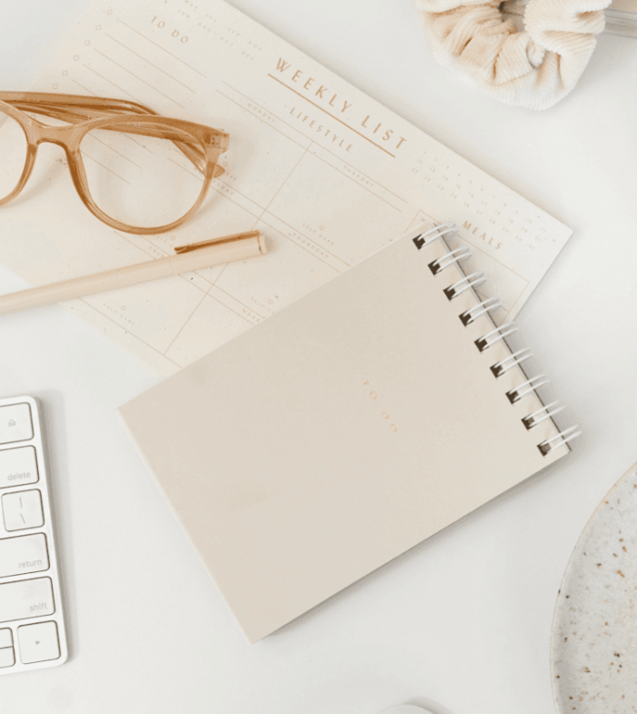 Styled workspace with notebook and coffee