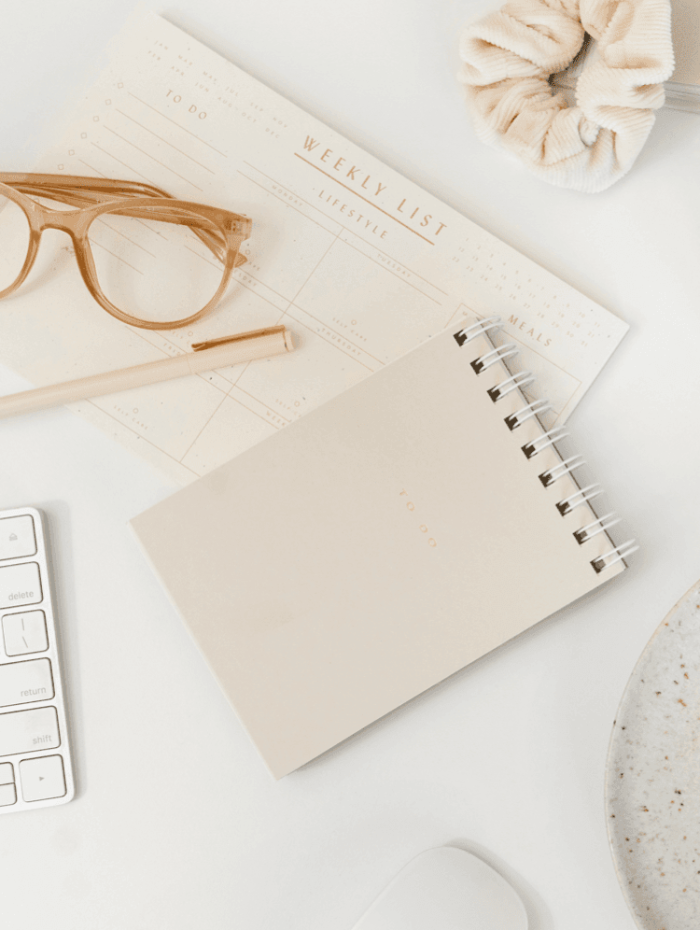Styled workspace with notebook and coffee